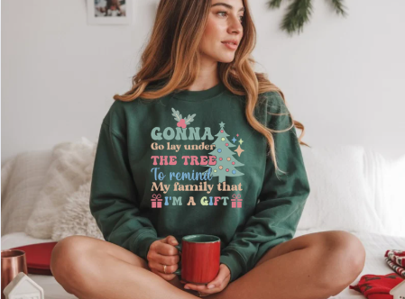 Christmas Sweatshirt — "Gonna Go Lay Under The Tree To Remind My Family I'm A Gift" Holiday Crewneck